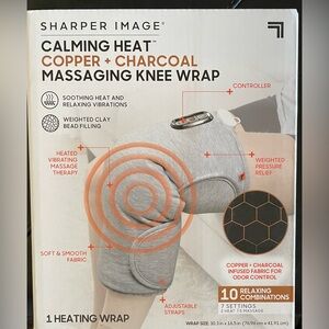 New- Never opened Sharper Image Copper and Charcoal Heated Knee Wrap